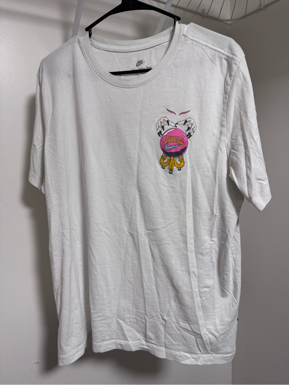 Nike White Tee with Pink Crystal Ball Graphic